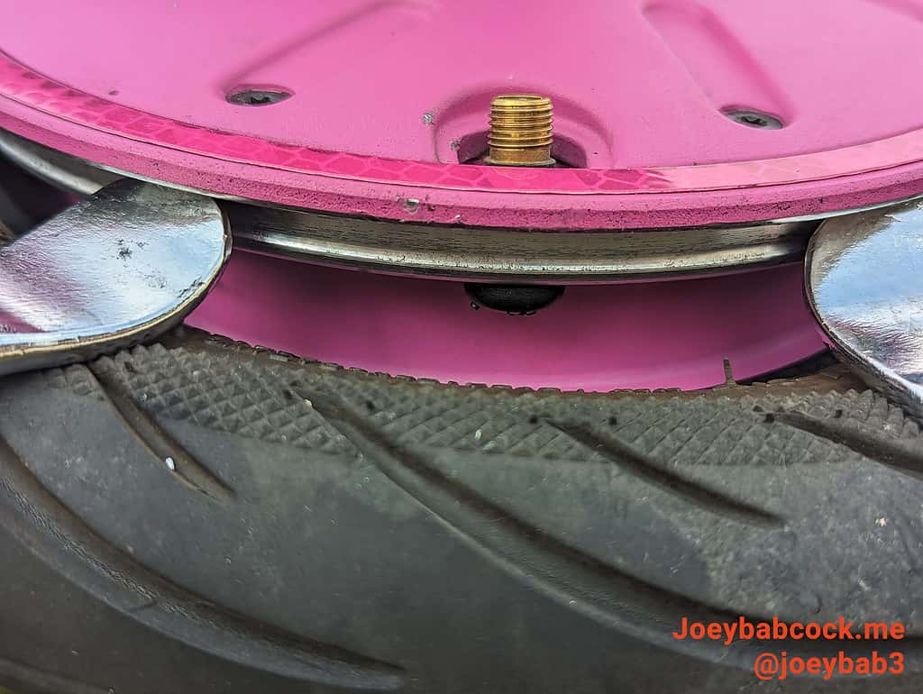 The tire still on the rim. You will need to debead the tire in order to access the valve stem and replace it.